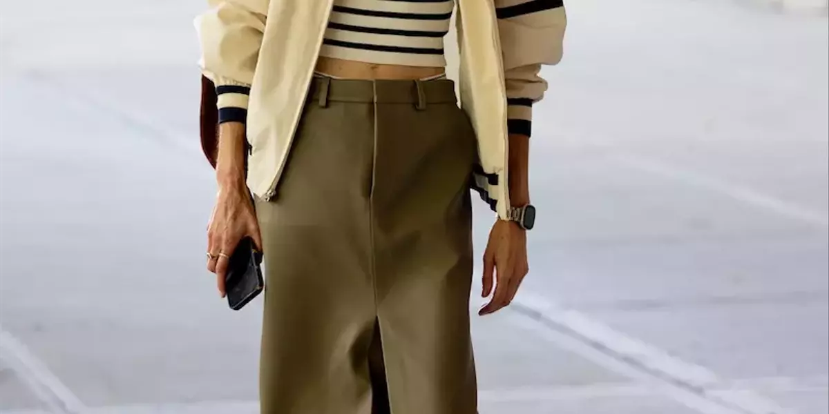 L'insolita Armonia: La Varsity Jacket Incontra la Longuette in Pelle