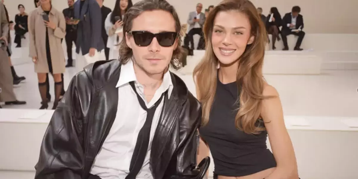 Distanza Familiare: Brooklyn Beckham e Nicola Peltz Evitano la Sfilata di Victoria a Parigi